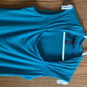 Banana republic stretch top. Size large. So cute and I love the shoulders!